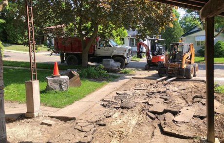 Excavating in Guelph to install new asphalt driveway with dump truck